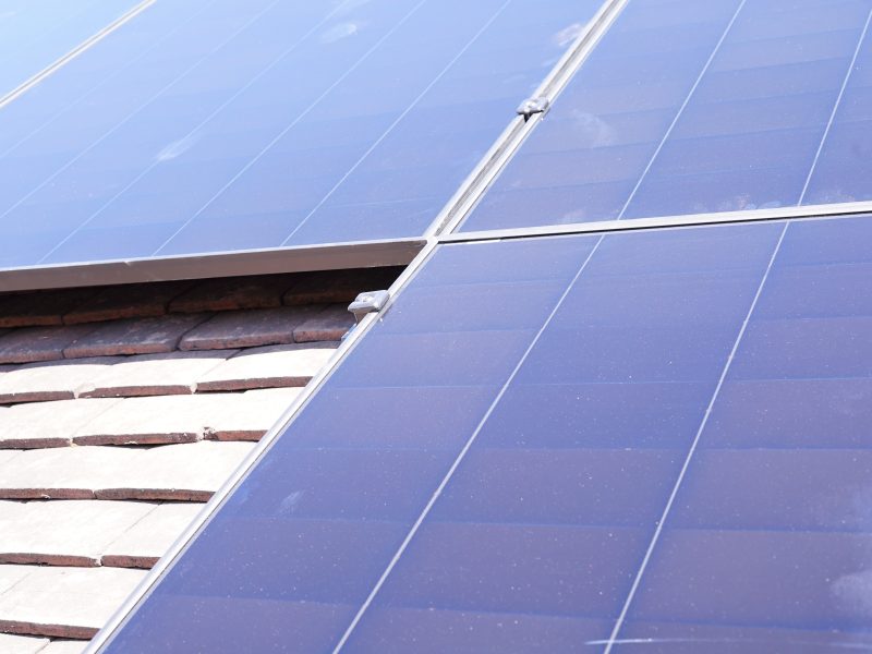 house with multiple solar panels